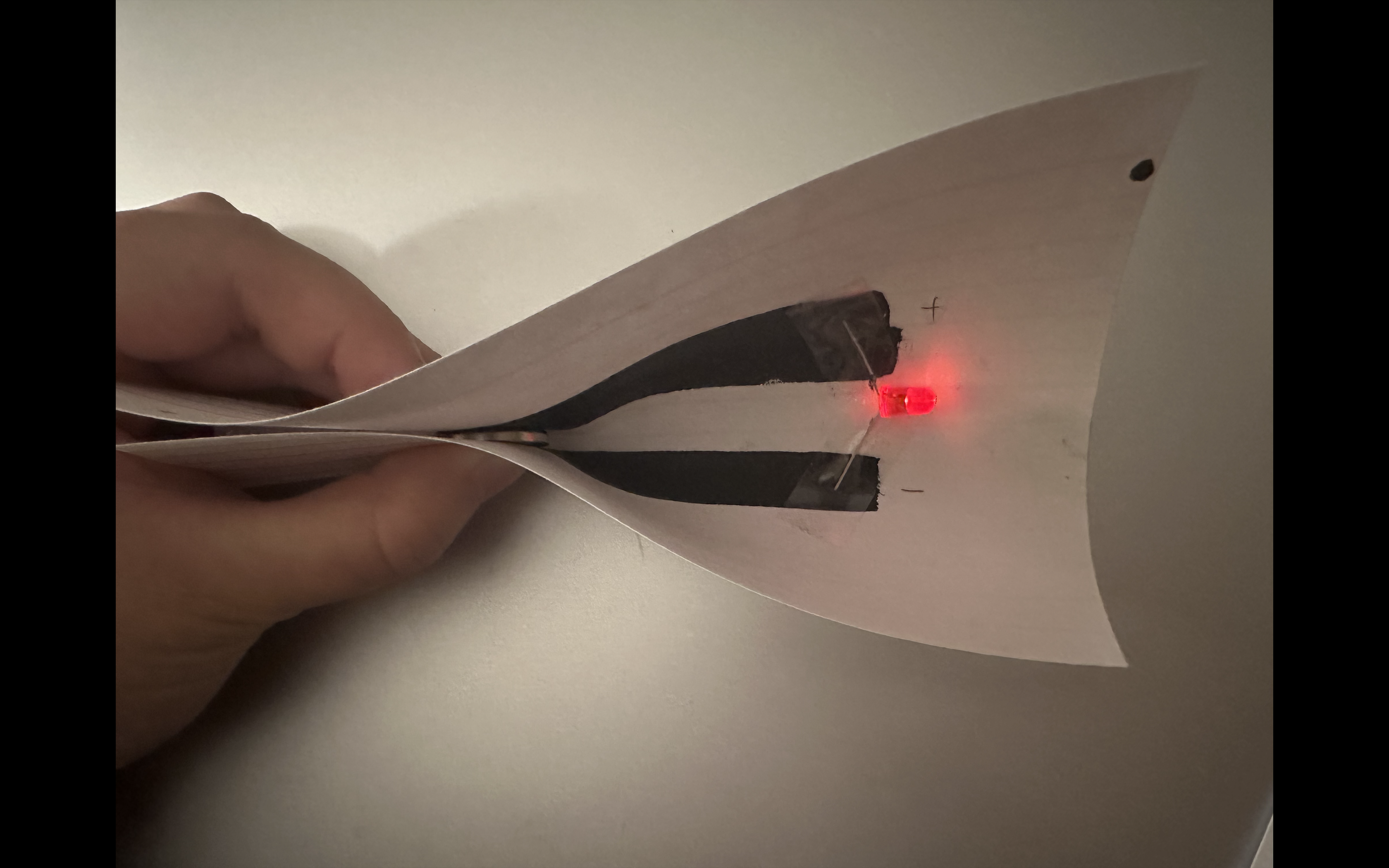 When I folded the paper, I could see that the circuit worked, but the light was not very bright compared to copper tape.