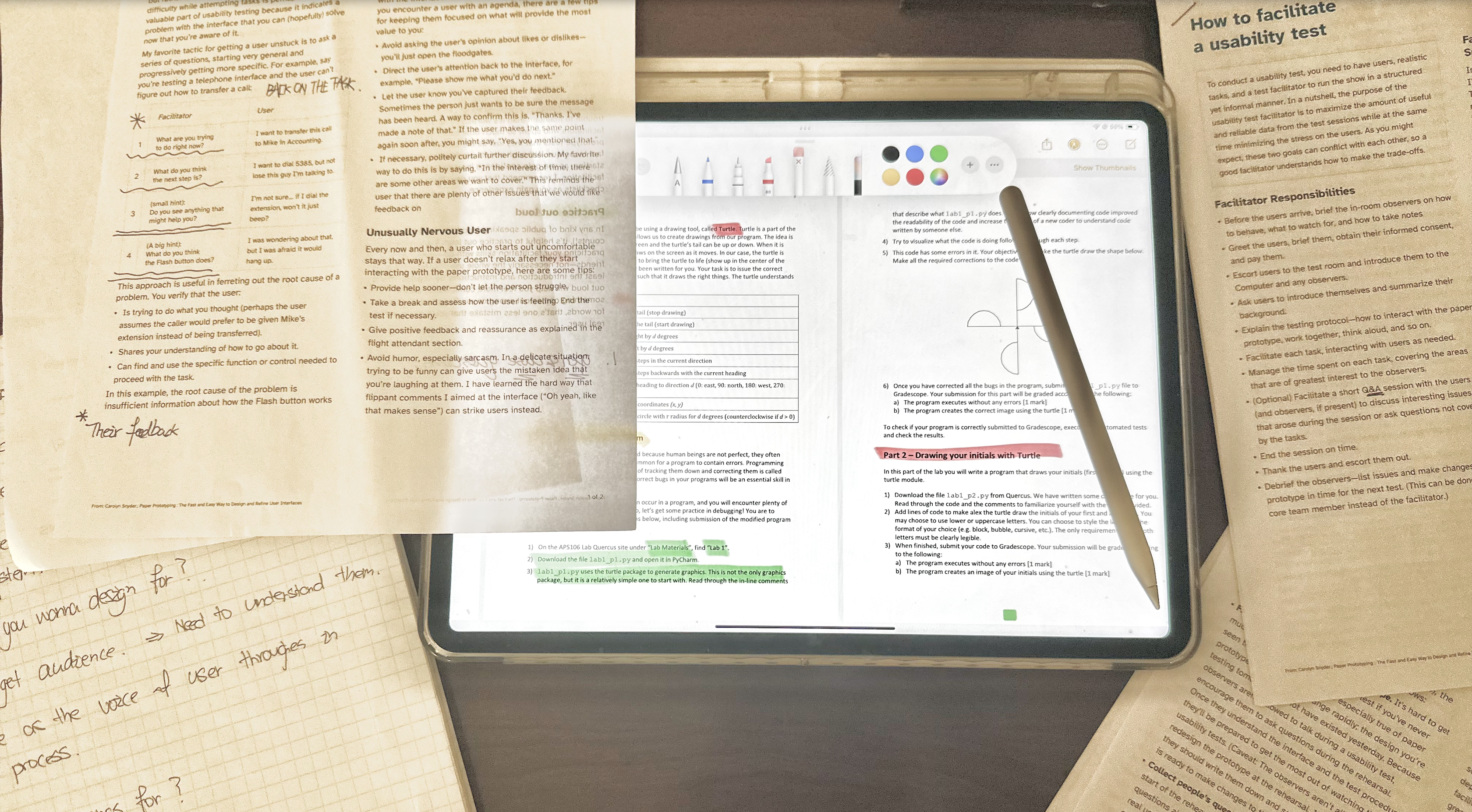 A classroom desk setup while taking notes during class